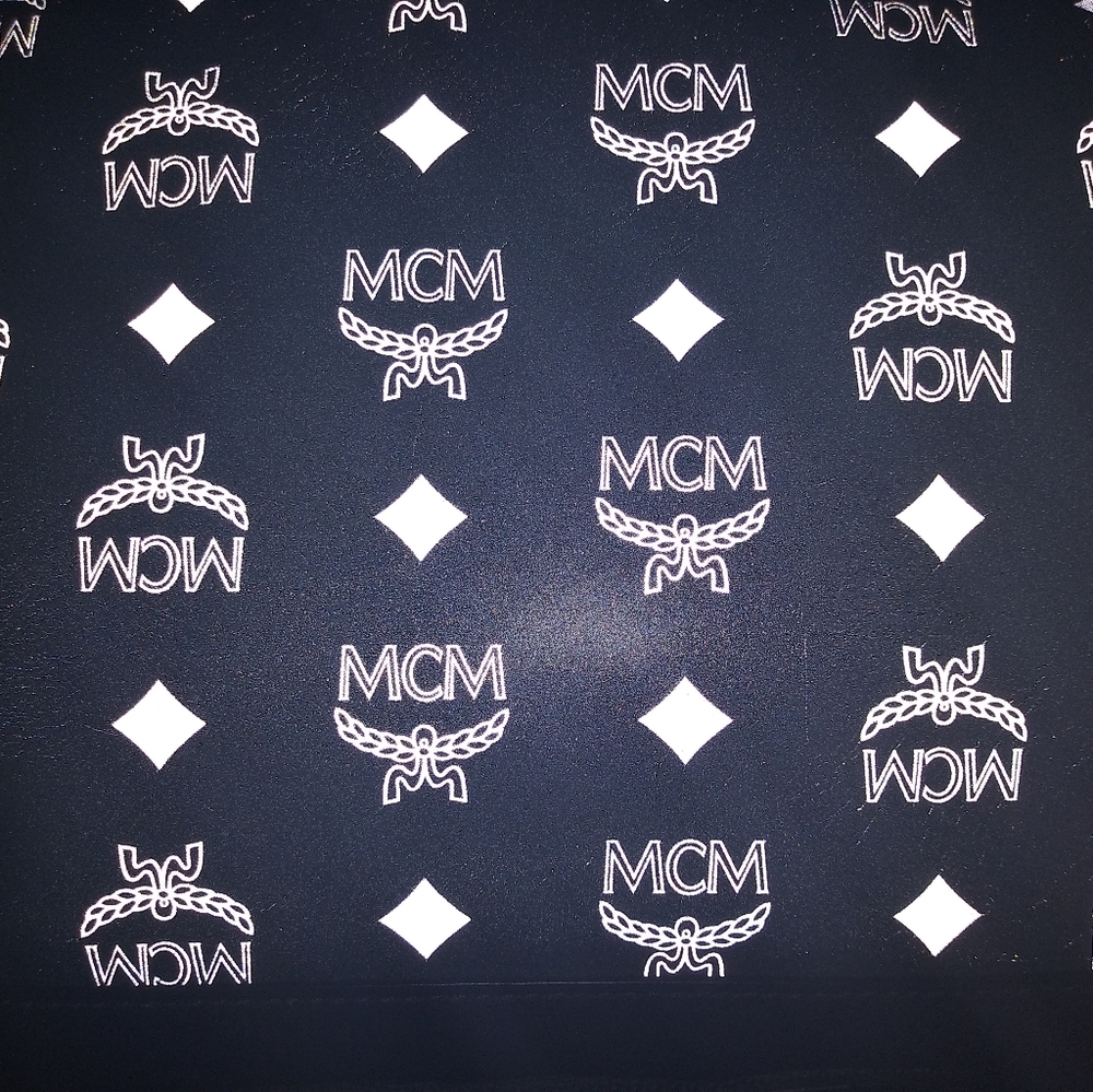 MCM clutch with wristlet
